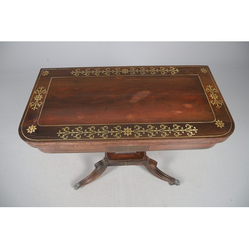 475 - A PAIR OF REGENCY ROSEWOOD AND BRASS INLAID GAMES TABLES. with D-end baize lined swivel tops, inlaid... 