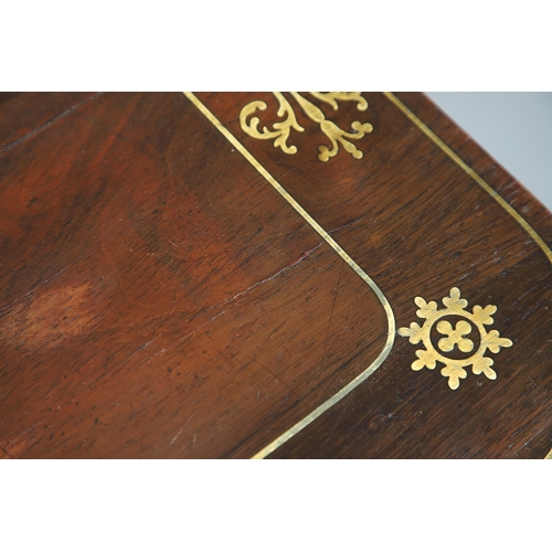 475 - A PAIR OF REGENCY ROSEWOOD AND BRASS INLAID GAMES TABLES. with D-end baize lined swivel tops, inlaid... 