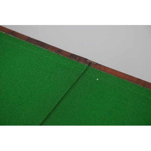 475 - A PAIR OF REGENCY ROSEWOOD AND BRASS INLAID GAMES TABLES. with D-end baize lined swivel tops, inlaid... 