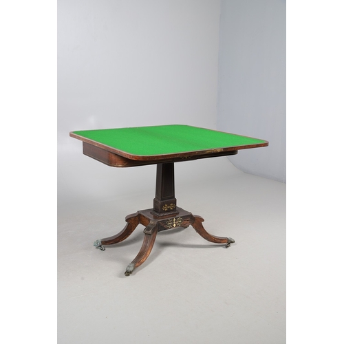 475 - A PAIR OF REGENCY ROSEWOOD AND BRASS INLAID GAMES TABLES. with D-end baize lined swivel tops, inlaid... 