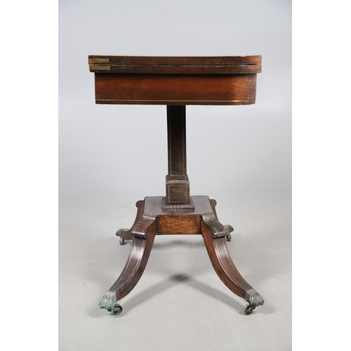 475 - A PAIR OF REGENCY ROSEWOOD AND BRASS INLAID GAMES TABLES. with D-end baize lined swivel tops, inlaid... 