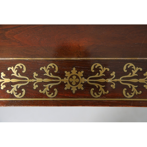 475 - A PAIR OF REGENCY ROSEWOOD AND BRASS INLAID GAMES TABLES. with D-end baize lined swivel tops, inlaid... 