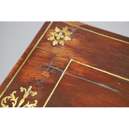 475 - A PAIR OF REGENCY ROSEWOOD AND BRASS INLAID GAMES TABLES. with D-end baize lined swivel tops, inlaid... 