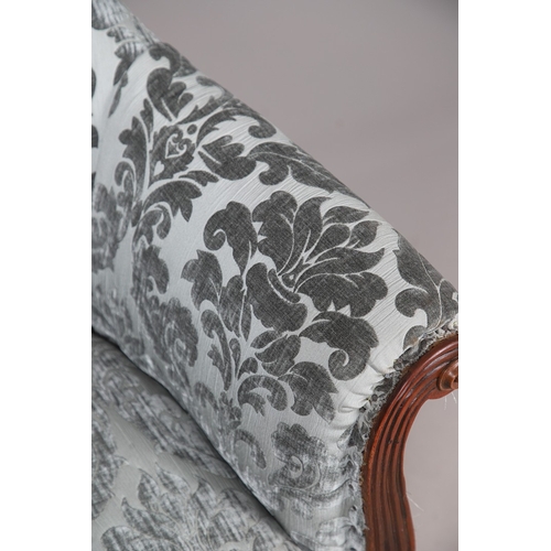 476 - A WILLIAM IV GILLOWS STYLE MAHOGANY LIBRARY CHAIR. the concave back to overstuffed arms, carved reed... 