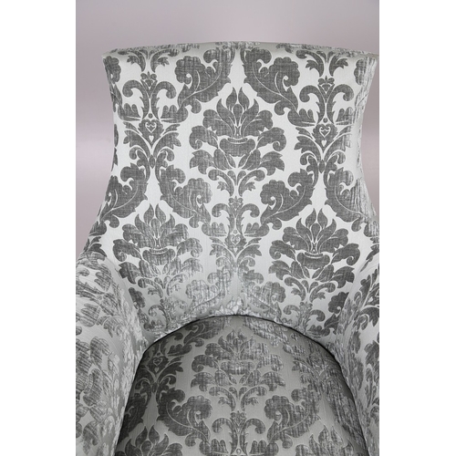 476 - A WILLIAM IV GILLOWS STYLE MAHOGANY LIBRARY CHAIR. the concave back to overstuffed arms, carved reed... 