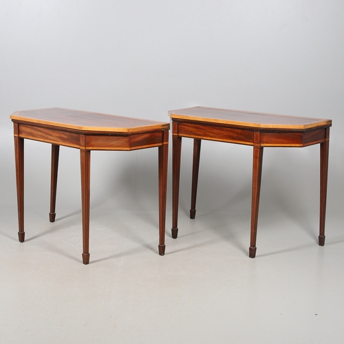 483 - A PAIR OF EDWARDIAN SHERATON STYLE MAHOGANY CARD TABLES. the canted rectangular tops crossbanded wit... 