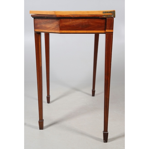 483 - A PAIR OF EDWARDIAN SHERATON STYLE MAHOGANY CARD TABLES. the canted rectangular tops crossbanded wit... 