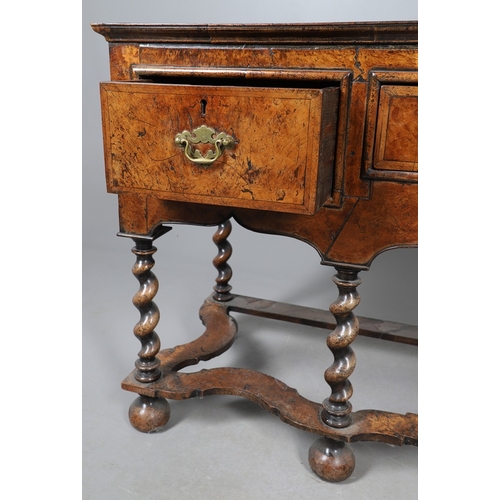492 - AN 18TH CENTURY STYLE WALNUT DRESSER BASE. constructed from old timbers, the feather banded top with... 