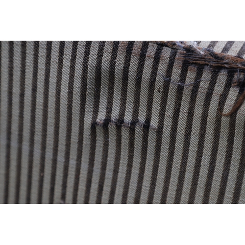 493 - A REGENCY EBONISED AND GILT FRAME THREE SEAT SETTEE IN THE MANNER OF GEORGE BULLOCK. upon eight ebon... 