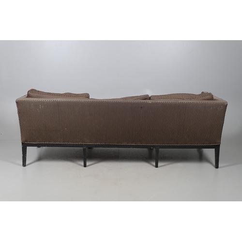493 - A REGENCY EBONISED AND GILT FRAME THREE SEAT SETTEE IN THE MANNER OF GEORGE BULLOCK. upon eight ebon... 