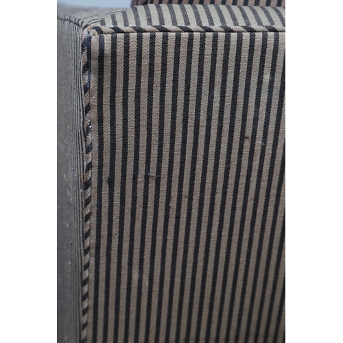 493 - A REGENCY EBONISED AND GILT FRAME THREE SEAT SETTEE IN THE MANNER OF GEORGE BULLOCK. upon eight ebon... 