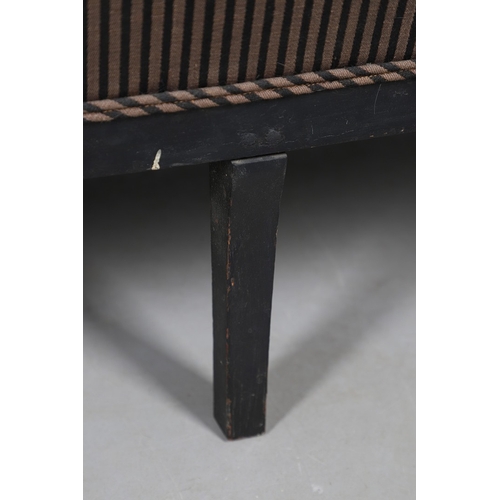 493 - A REGENCY EBONISED AND GILT FRAME THREE SEAT SETTEE IN THE MANNER OF GEORGE BULLOCK. upon eight ebon... 