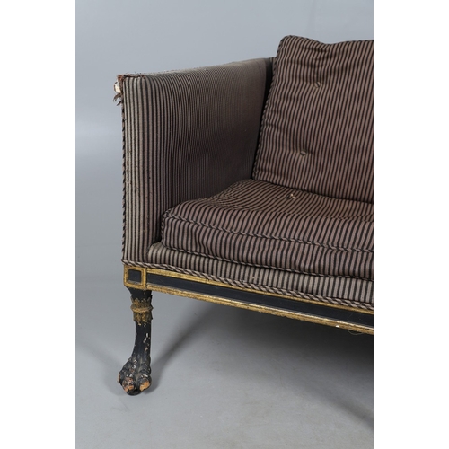 493 - A REGENCY EBONISED AND GILT FRAME THREE SEAT SETTEE IN THE MANNER OF GEORGE BULLOCK. upon eight ebon... 