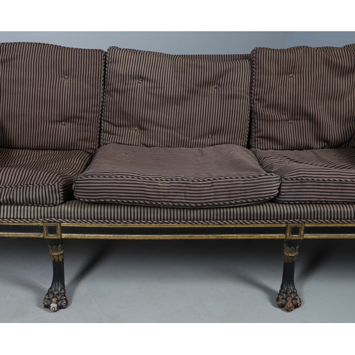 493 - A REGENCY EBONISED AND GILT FRAME THREE SEAT SETTEE IN THE MANNER OF GEORGE BULLOCK. upon eight ebon... 