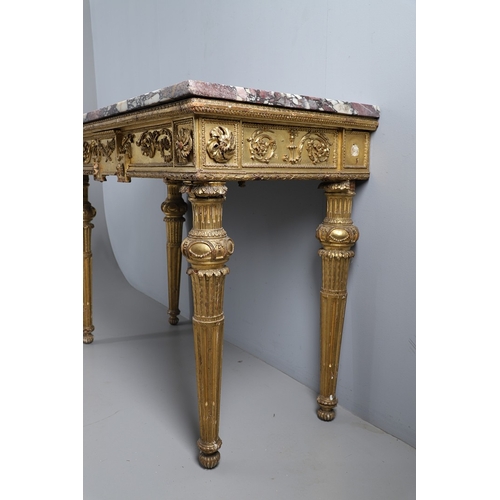 495 - AN ITALIAN GILTWOOD AND MARBLE TOPPED PIER TABLE. late 18th century, the violet breche vola marble t... 