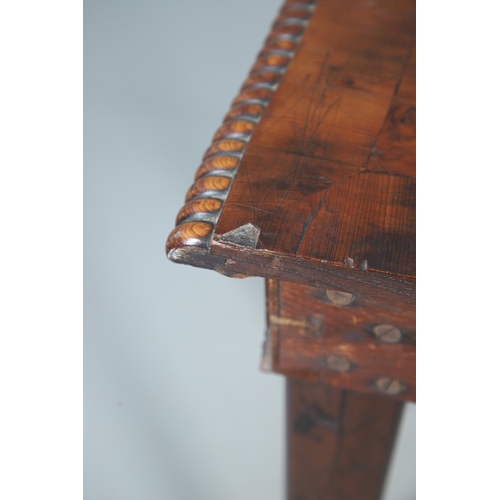 502 - A REGENCY YEW WOOD SIDE TABLE. the shaped top with canted corners and half beaded border, above acan... 