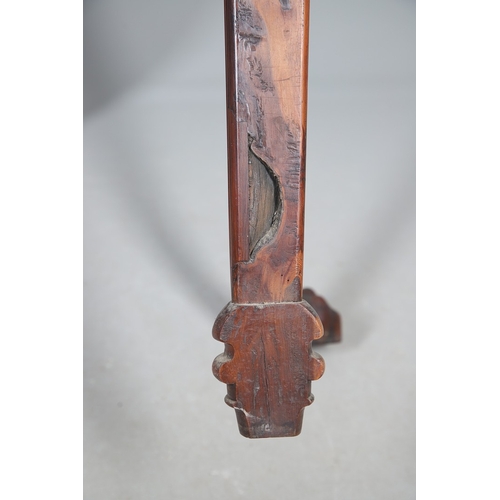 502 - A REGENCY YEW WOOD SIDE TABLE. the shaped top with canted corners and half beaded border, above acan... 