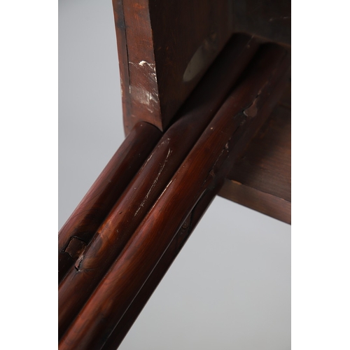 502 - A REGENCY YEW WOOD SIDE TABLE. the shaped top with canted corners and half beaded border, above acan... 