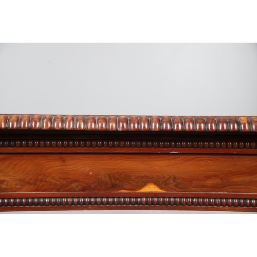 502 - A REGENCY YEW WOOD SIDE TABLE. the shaped top with canted corners and half beaded border, above acan... 