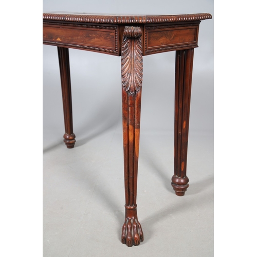 502 - A REGENCY YEW WOOD SIDE TABLE. the shaped top with canted corners and half beaded border, above acan... 
