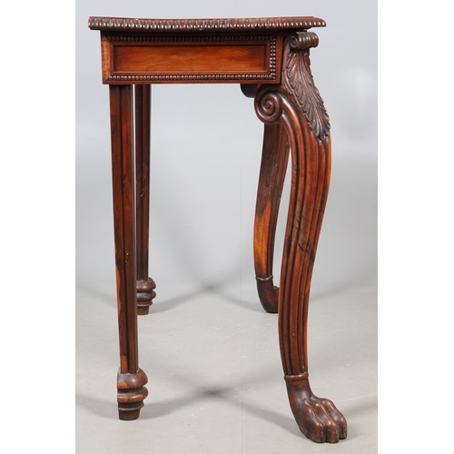502 - A REGENCY YEW WOOD SIDE TABLE. the shaped top with canted corners and half beaded border, above acan... 