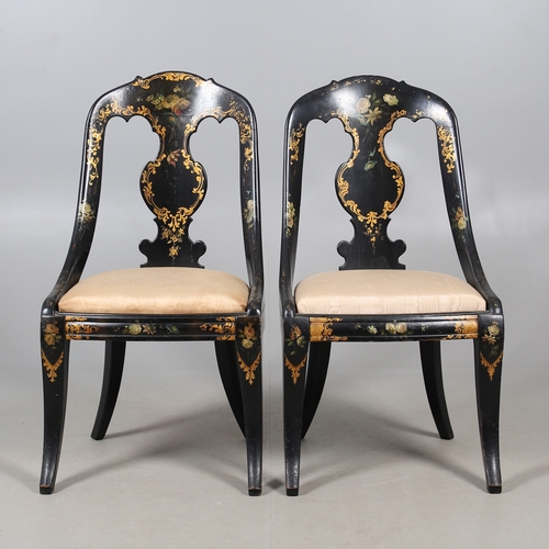 503 - A PAIR OF 19TH CENTURY EBONISED, GILT AND PAINTED CHAIRS. the curved paper mache backs painted with ... 