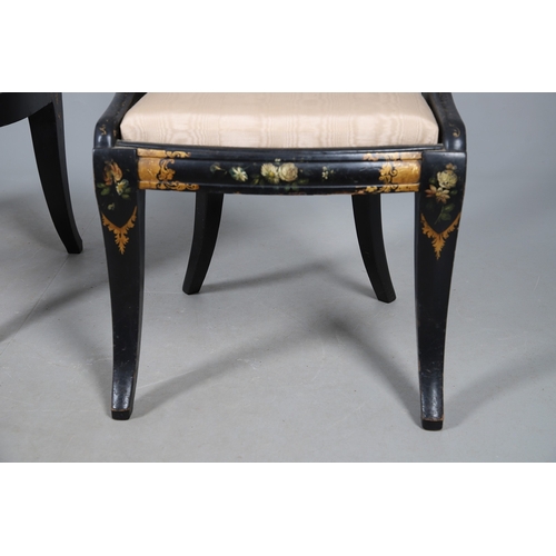 503 - A PAIR OF 19TH CENTURY EBONISED, GILT AND PAINTED CHAIRS. the curved paper mache backs painted with ... 
