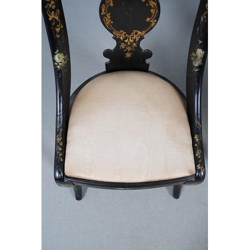 503 - A PAIR OF 19TH CENTURY EBONISED, GILT AND PAINTED CHAIRS. the curved paper mache backs painted with ... 