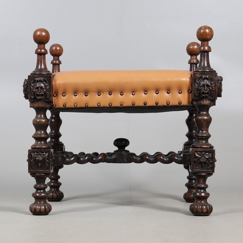 506 - A RENAISSANCE REVIVAL OAK AND WALNUT LEATHER SEATED STOOL. 19th century, the brass studded tan leath... 