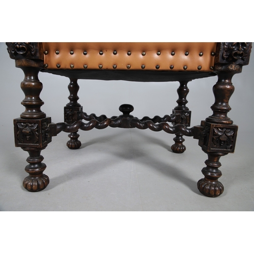 506 - A RENAISSANCE REVIVAL OAK AND WALNUT LEATHER SEATED STOOL. 19th century, the brass studded tan leath... 