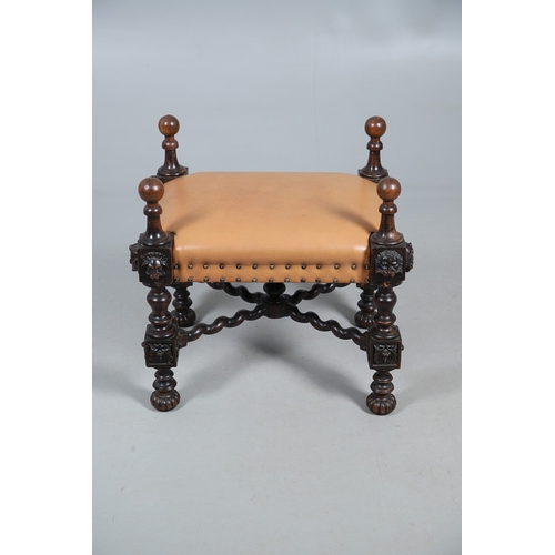 506 - A RENAISSANCE REVIVAL OAK AND WALNUT LEATHER SEATED STOOL. 19th century, the brass studded tan leath... 