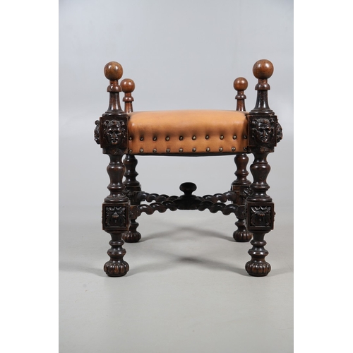 506 - A RENAISSANCE REVIVAL OAK AND WALNUT LEATHER SEATED STOOL. 19th century, the brass studded tan leath... 
