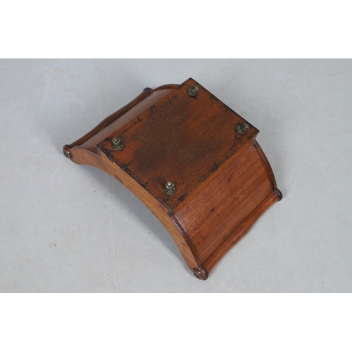 510 - A GEORGE III MAHOGANY CHEESE COASTER. the two divisions with scroll ends and swirl detail, raised on... 