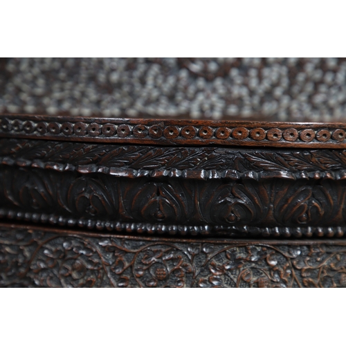 521 - A 19TH CENTURY BURMESE HARDWOOD SIDE CABINET. the raised back over a serpentine front and concave si... 