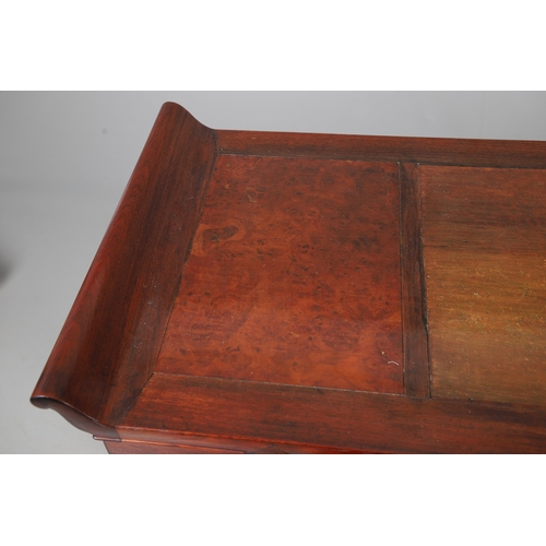 524 - A CHINESE HUANGHUALI HARDWOOD ALTER STYLE TABLE. mid-late 20th century, the scroll ended top with in... 