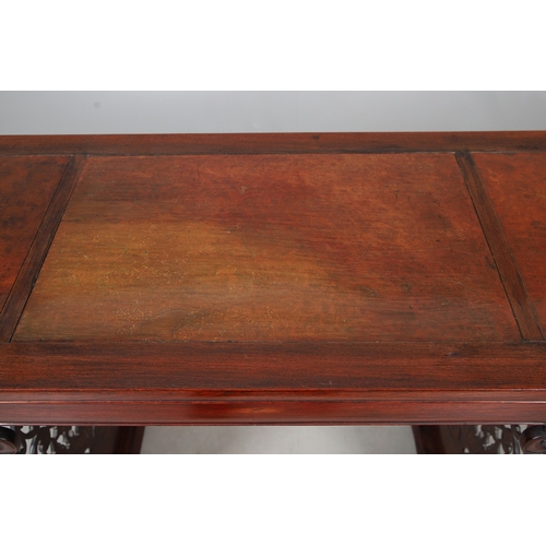524 - A CHINESE HUANGHUALI HARDWOOD ALTER STYLE TABLE. mid-late 20th century, the scroll ended top with in... 