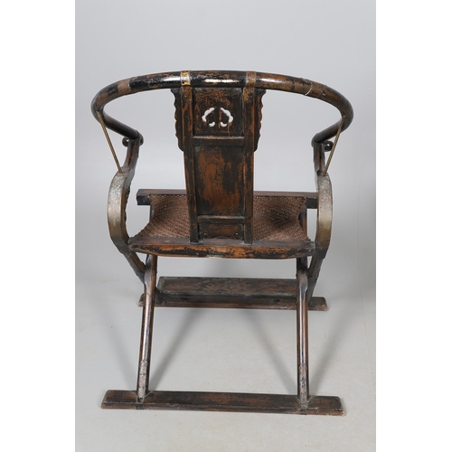 526 - A PAIR OF CHINESE MING DYNASTY STYLE HARDWOOD FOLDING CHAIRS. the horseshoe shaped back to a central... 