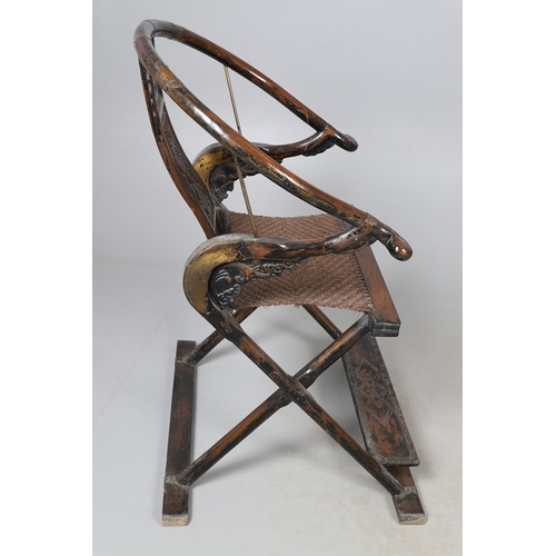 526 - A PAIR OF CHINESE MING DYNASTY STYLE HARDWOOD FOLDING CHAIRS. the horseshoe shaped back to a central... 