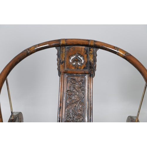 526 - A PAIR OF CHINESE MING DYNASTY STYLE HARDWOOD FOLDING CHAIRS. the horseshoe shaped back to a central... 