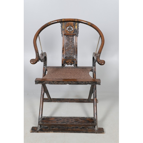 526 - A PAIR OF CHINESE MING DYNASTY STYLE HARDWOOD FOLDING CHAIRS. the horseshoe shaped back to a central... 