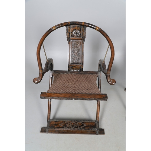 526 - A PAIR OF CHINESE MING DYNASTY STYLE HARDWOOD FOLDING CHAIRS. the horseshoe shaped back to a central... 