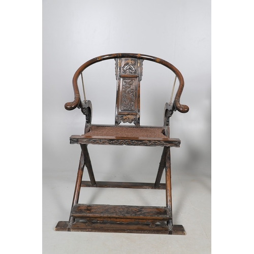 526 - A PAIR OF CHINESE MING DYNASTY STYLE HARDWOOD FOLDING CHAIRS. the horseshoe shaped back to a central... 