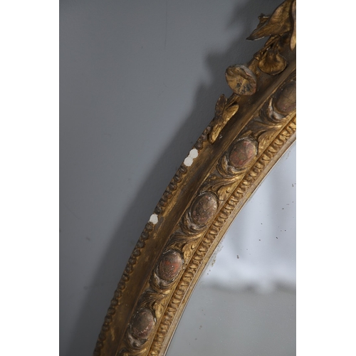 535 - A LARGE 19TH CENTURY GILT GESSO OVAL WALL MIRROR. the tripple section plate to a wire mounted gilt g... 