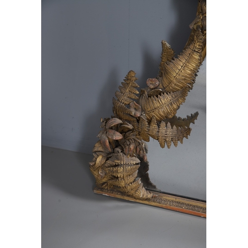 535 - A LARGE 19TH CENTURY GILT GESSO OVAL WALL MIRROR. the tripple section plate to a wire mounted gilt g... 