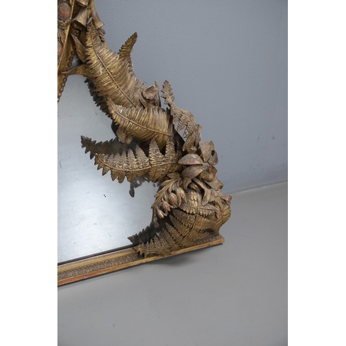 535 - A LARGE 19TH CENTURY GILT GESSO OVAL WALL MIRROR. the tripple section plate to a wire mounted gilt g... 