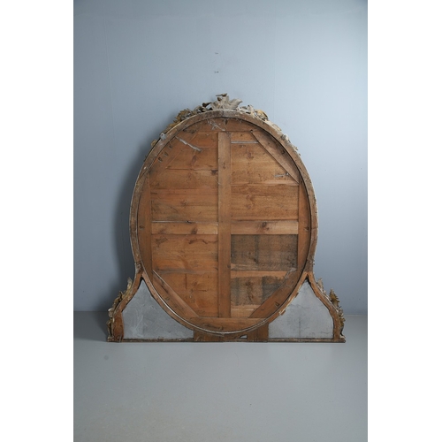 535 - A LARGE 19TH CENTURY GILT GESSO OVAL WALL MIRROR. the tripple section plate to a wire mounted gilt g... 