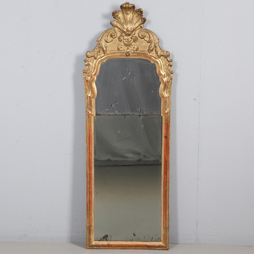 541 - AN 18TH CENTURY GILTWOOD PIER MIRROR. the split rectangular bevelled plate with flowerhead cut motif... 