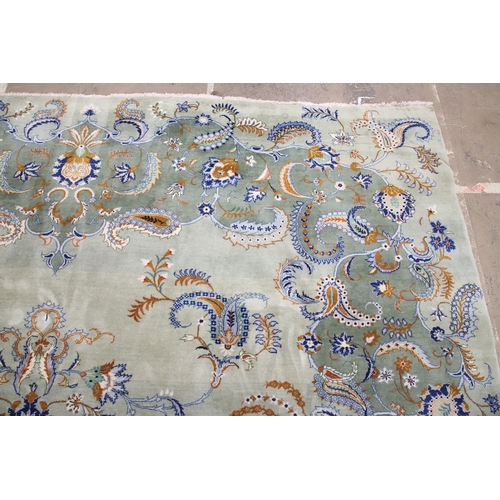 546 - A KASHAN CARPET, CIRCA 1970. The ice blue field centred by a flowerhead medallion surrounded by vine... 