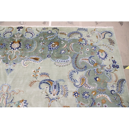 546 - A KASHAN CARPET, CIRCA 1970. The ice blue field centred by a flowerhead medallion surrounded by vine... 