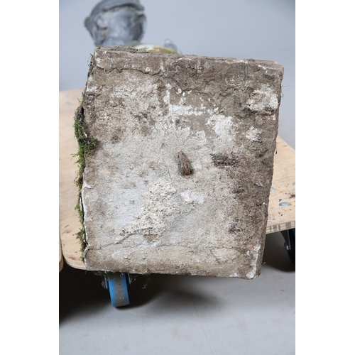 562 - A PAIR OF 19TH CENTURY LEAD GARDEN STATUES OF PUTTI. modelled wearing military style helmets, one wi... 